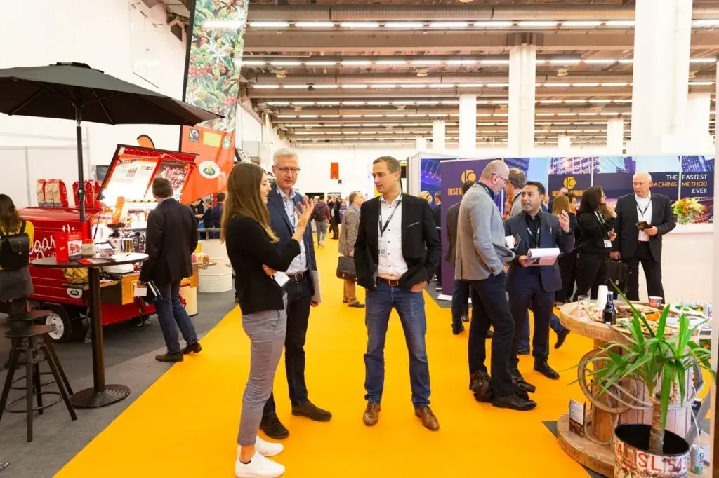 Visitors exploring the Franchise Expo Germany exhibition